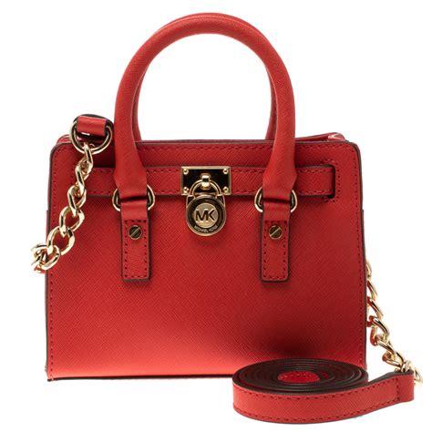 michael kors crossbody red and brown|Michael Kors handbags red used.